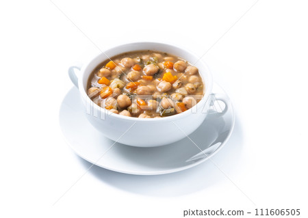 Chickpeas soup with vegetables in bowl on wooden table 111606505