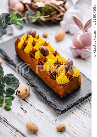 easter cake with chocolate and vanilla cream 111607680