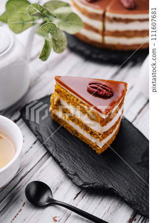 Delicious cheesecake with caramel and walnuts Delicious cheesecake with caramel and walnuts 111607681