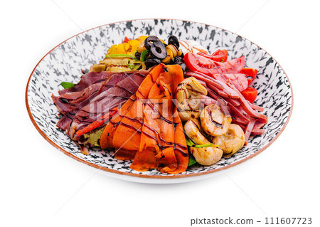 salad of various meats with mushrooms, carrots and lettuce leaves salad of various meats with mushrooms, carrots and lettuce leaves 111607723