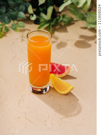 Citrus juice with orange and grapefruit top view Citrus juice with orange and grapefruit top view 111608024