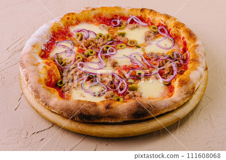 Italian Pizza with tuna and red onion Italian Pizza with tuna and red onion 111608068
