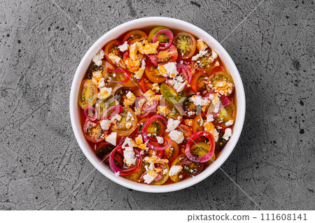 salad with cherry tomatoes and goat cheese salad with cherry tomatoes and goat cheese 111608141
