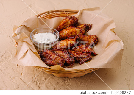Barbecue chicken wings in the basket 111608287