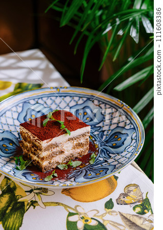 Piece of traditional italian Tiramisu dessert cake 111608386