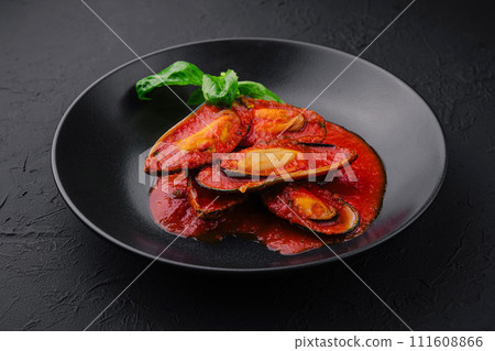 Cooked Mussels with hot spiced sauce Cooked Mussels with hot spiced sauce 111608866