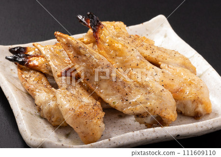 Grilled chicken wing tips with salt 111609110
