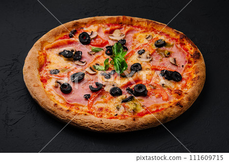 Appetizing sicilian pizza with ham and black olives 111609715