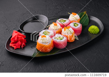 sushi rolls wrapped with salmon and tuna sushi rolls wrapped with salmon and tuna 111609719