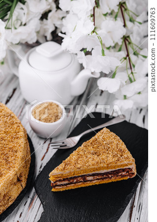 Traditional dessert honey cake with walnut 111609763