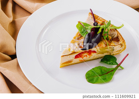 Quiche Lorraine on White Plates 111609921