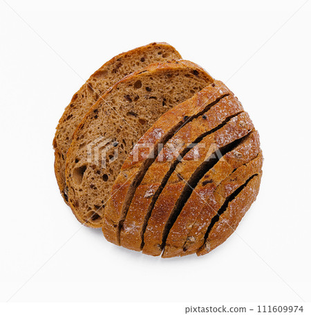 Flat-lay of freshly baked sourdough bread loaf and bread slices Flat-lay of freshly baked sourdough bread loaf and bread slices 111609974
