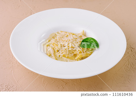 Penne Pasta with Parmesan in White Plate 111610436