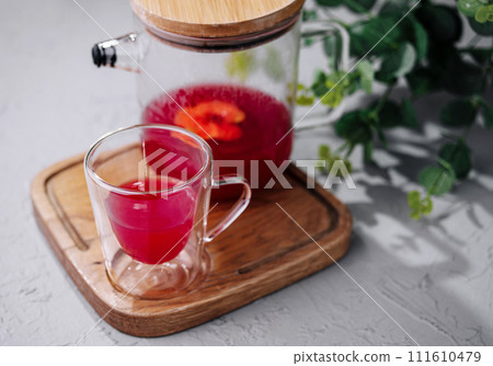 Raspberry Tea in Pitcher and Glass Raspberry Tea in Pitcher and Glass 111610479