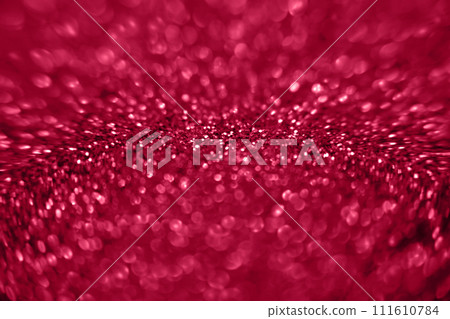 Golden color glitter background. Blurred monochrome background with bokeh. Blurred glitters shimmering dust macro close up. Golden color glitter background. Blurred monochrome background with bokeh. Blurred glitters shimmering dust macro close up. 111610784