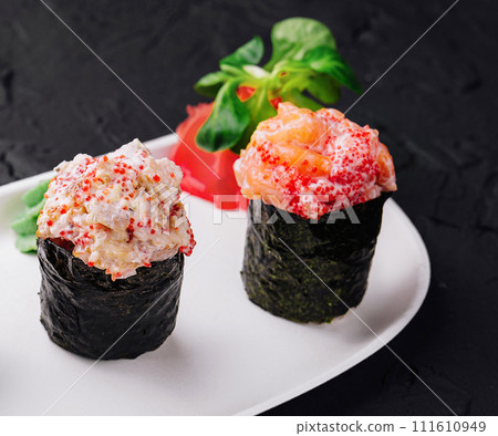 Different Gunkan Sushi on white plate Different Gunkan Sushi on white plate 111610949