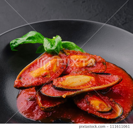 Cooked Mussels with hot spiced sauce 111611061