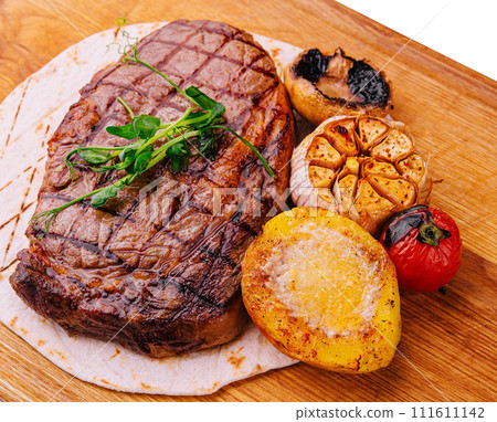 Grilled Tenderloin steak with vegetables Grilled Tenderloin steak with vegetables 111611142