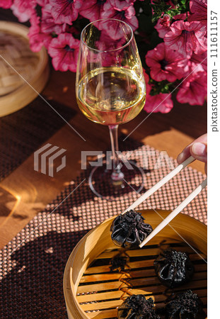 asian dumplings with cuttlefish ink top view 111611157