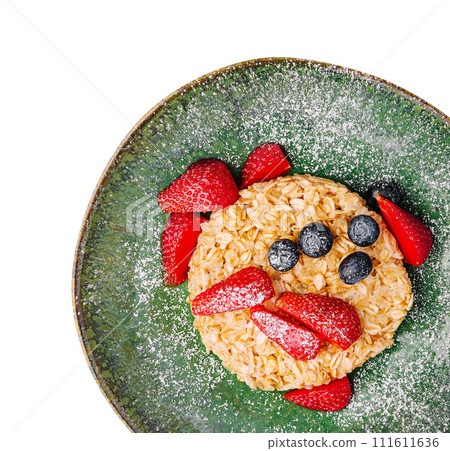 Tasty oatmeal porridge with blueberries and strawberries 111611636