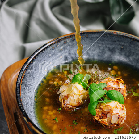 almond meatball soup on top view almond meatball soup on top view 111611679