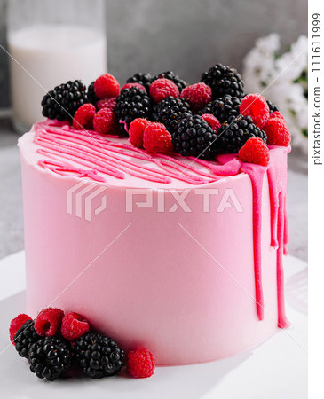 Pink cake with mascarpone cream and fresh berries 111611999