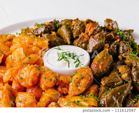 cabbage rolls and dolma cabbage rolls grape leaves filling 111612097