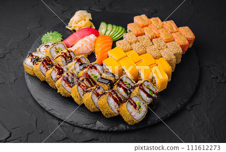 Sushi set on black stone background 111612273