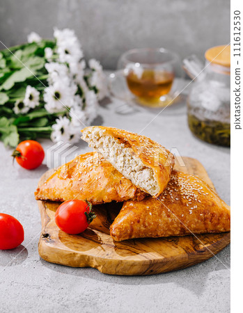 samsa with cottage cheese and tea 111612530