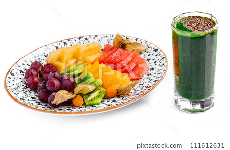 kiwi smoothie with different tropical fruits on a plate kiwi smoothie with different tropical fruits on a plate 111612631