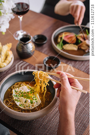 Kimchi noodle spicy soup with egg Kimchi noodle spicy soup with egg 111612718