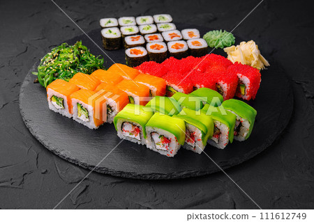 Sushi set on black stone background 111612749