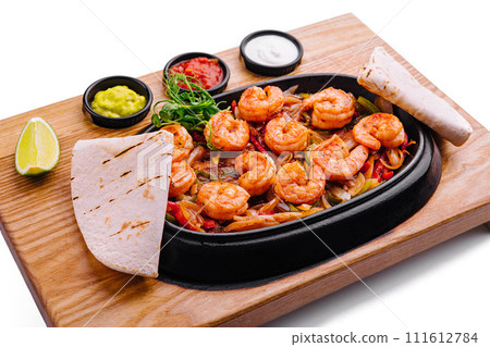 Shrimp fajitas with bell pepper and onion Shrimp fajitas with bell pepper and onion 111612784