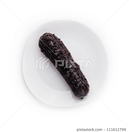 Cake eclair glazed with chocolate cream top view Cake eclair glazed with chocolate cream top view 111612799