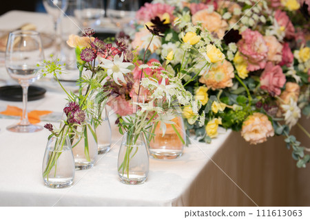 Table decoration flower arrangement decorated with colorful fresh flowers 111613063