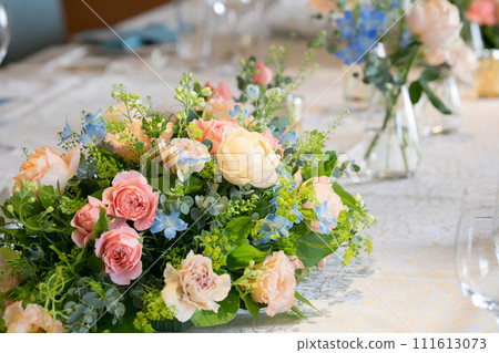 Decoration on the table: Fresh flowers in gentle colors Decoration on the table: Fresh flowers in gentle colors 111613073