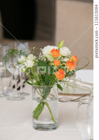 White and orange fresh flowers table decoration White and orange fresh flowers table decoration 111613084