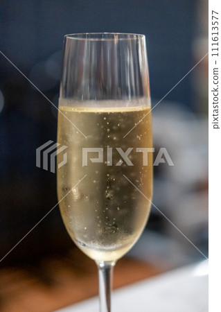 A glass of Prosecco or sparkling wine on the table 111613577