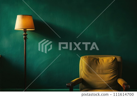 green wall with a chair and lamp nearby 111614700