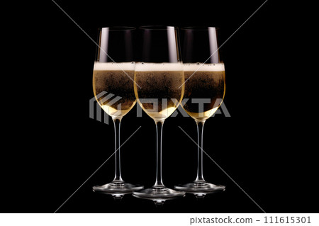 Set of crystal-clear flute glass of champagne isolated on black background Set of crystal-clear flute glass of champagne isolated on black background 111615301
