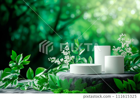 Cylinder podium for product demonstration on green background with nature elements like leaves, plants and flowers Cylinder podium for product demonstration on green background with nature elements like leaves, plants and flowers 111615325