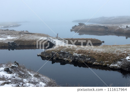 Foggy day at lake Myvatn, Iceland 111617964