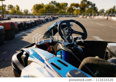 Go-kart car for carting with no people at open air training track Go-kart car for carting with no people at open air training track 111618326
