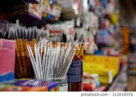 Paint brush assortment on display of creative stationery store 111618358