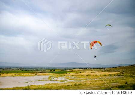 Flying on the wing, parachuting. Flying on the wing, parachuting. 111618639