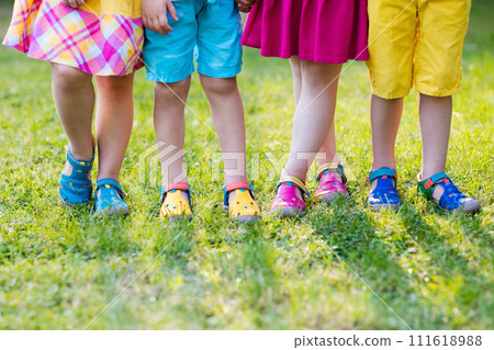 Kids with colorful shoes. Children footwear 111618988