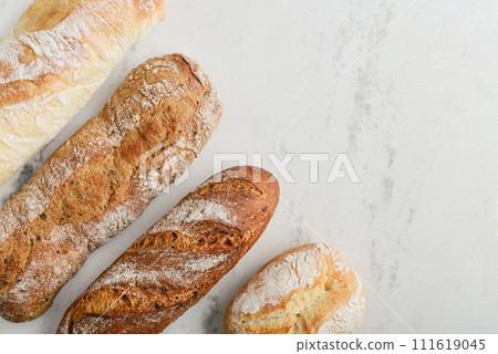 Assorted bakery products including loafs of bread Assorted bakery products including loafs of bread 111619045