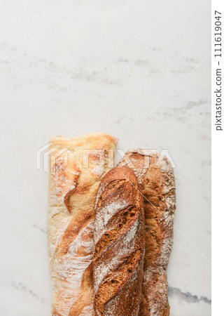 Assorted bakery products including loafs of bread 111619047