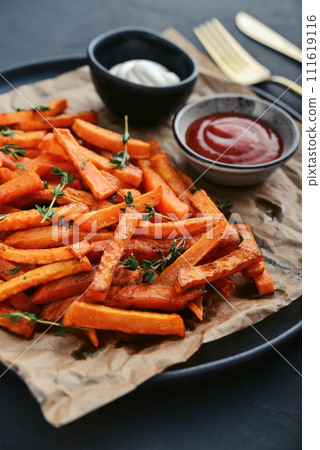 Sweet potato fries with mayo and ketchup 111619116