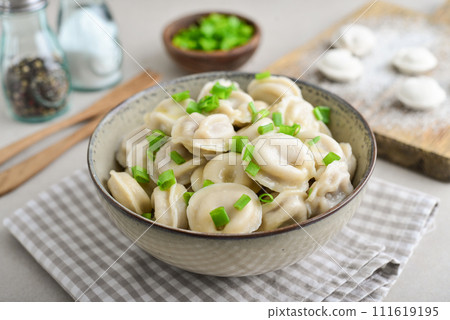 Russian pelmeni, dumplings with meat 111619195